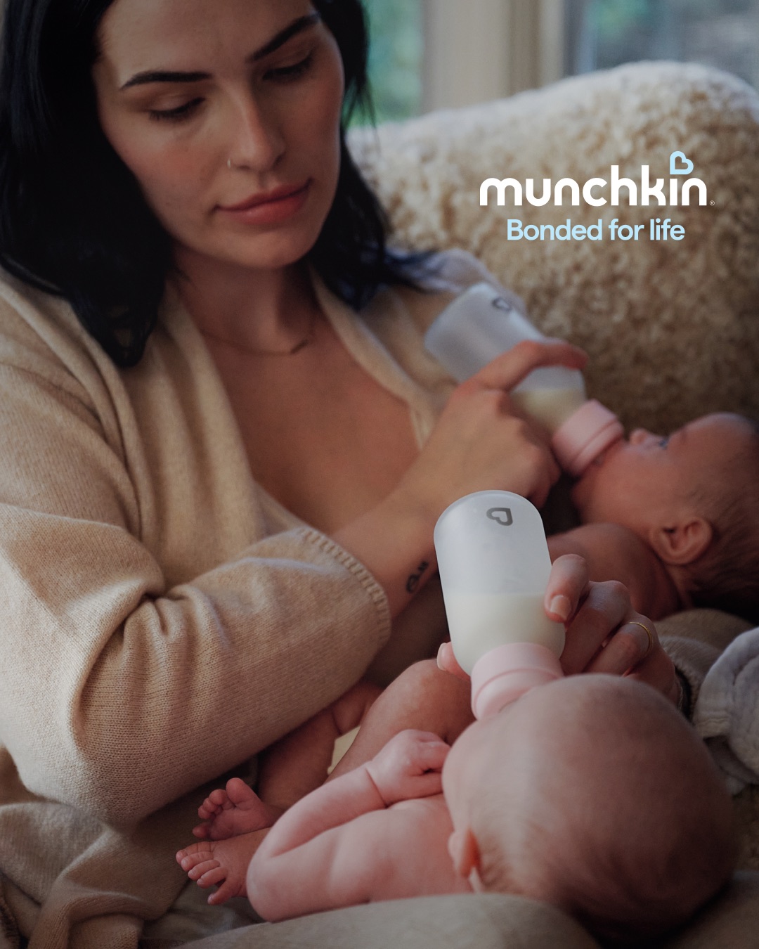 A mother with her baby, Bond bottle in frame