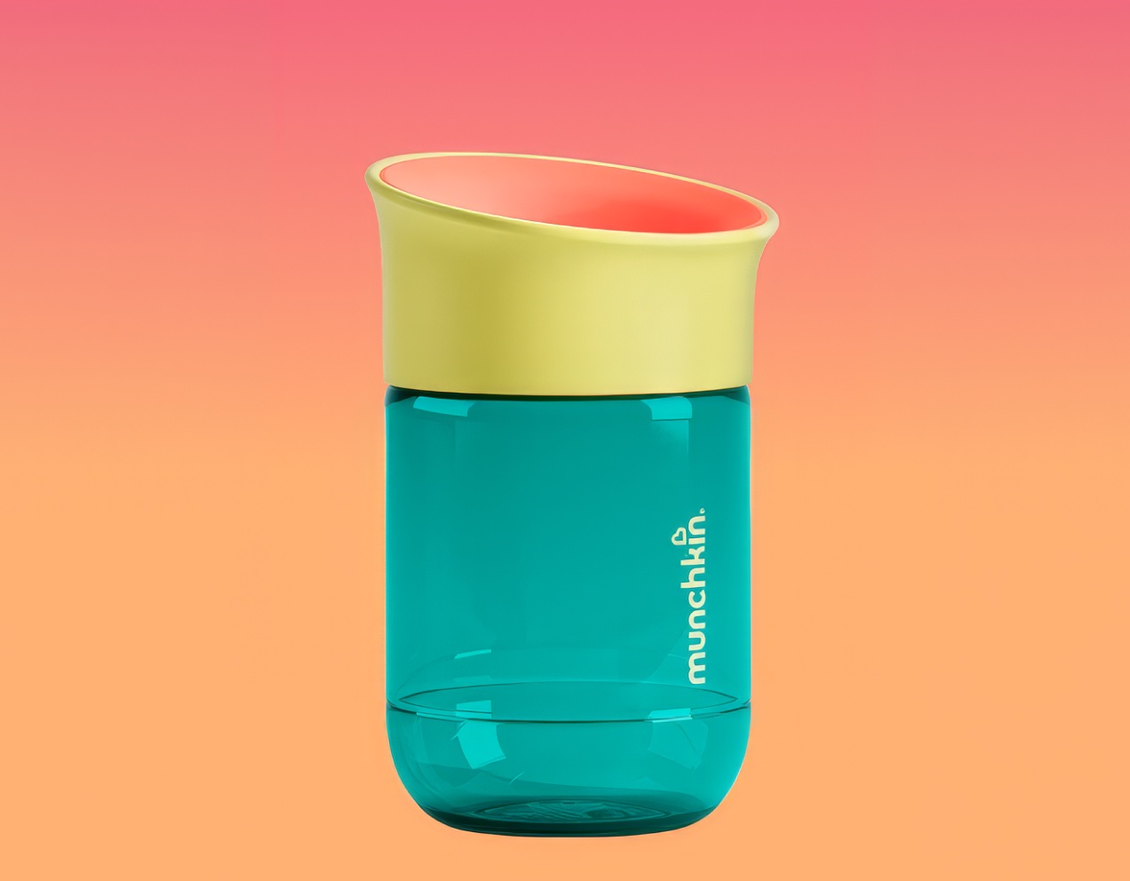 A teal Munchkin cup with a yellow rim on a colorful graphic background
